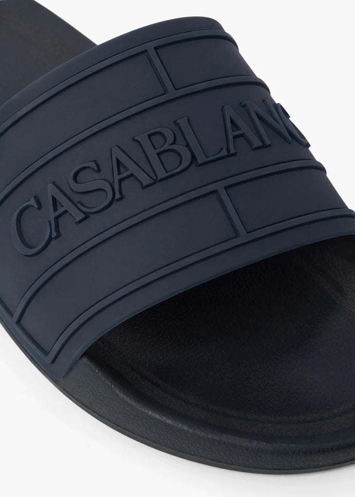 Claquettes de piscine pour homme bleues à logo