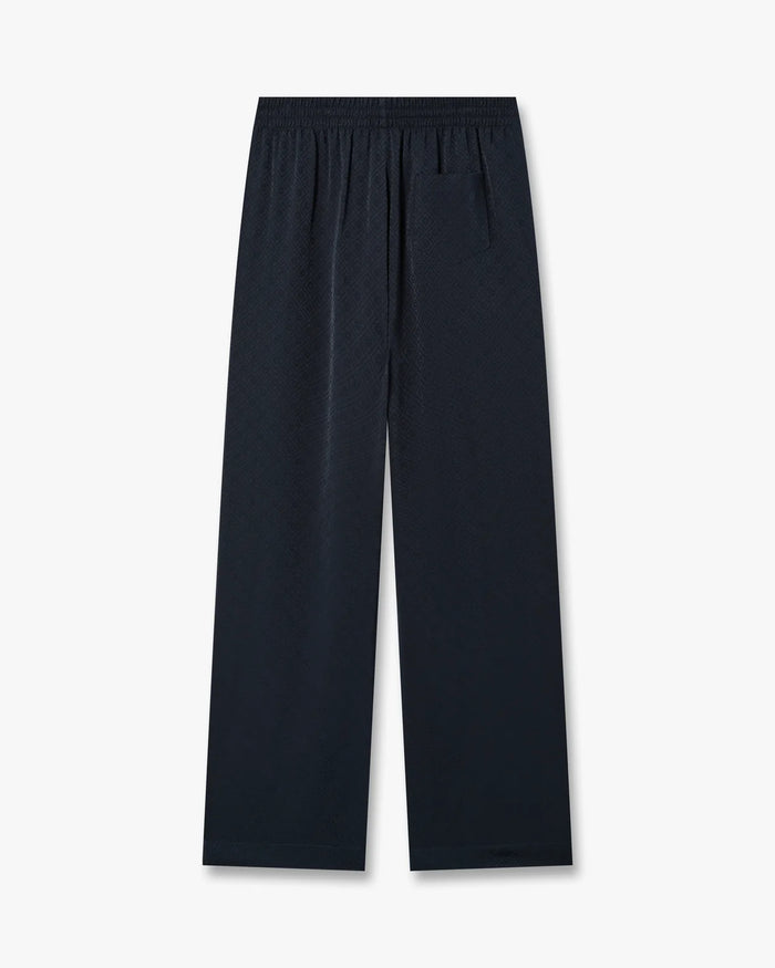 Pantalon en soie monogrammé bleu marine foncé